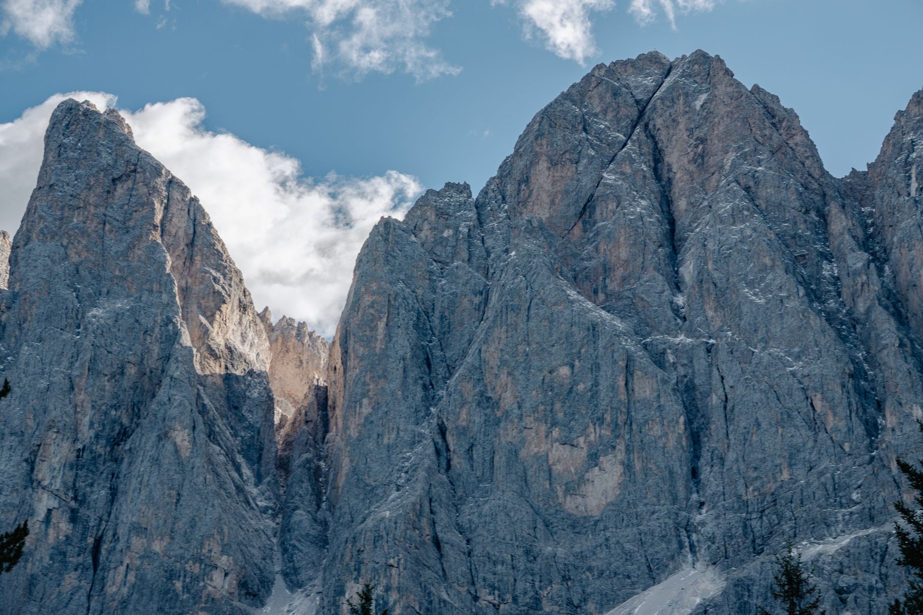 Morning sunlight washing over limestone peaks in the Dolomites
